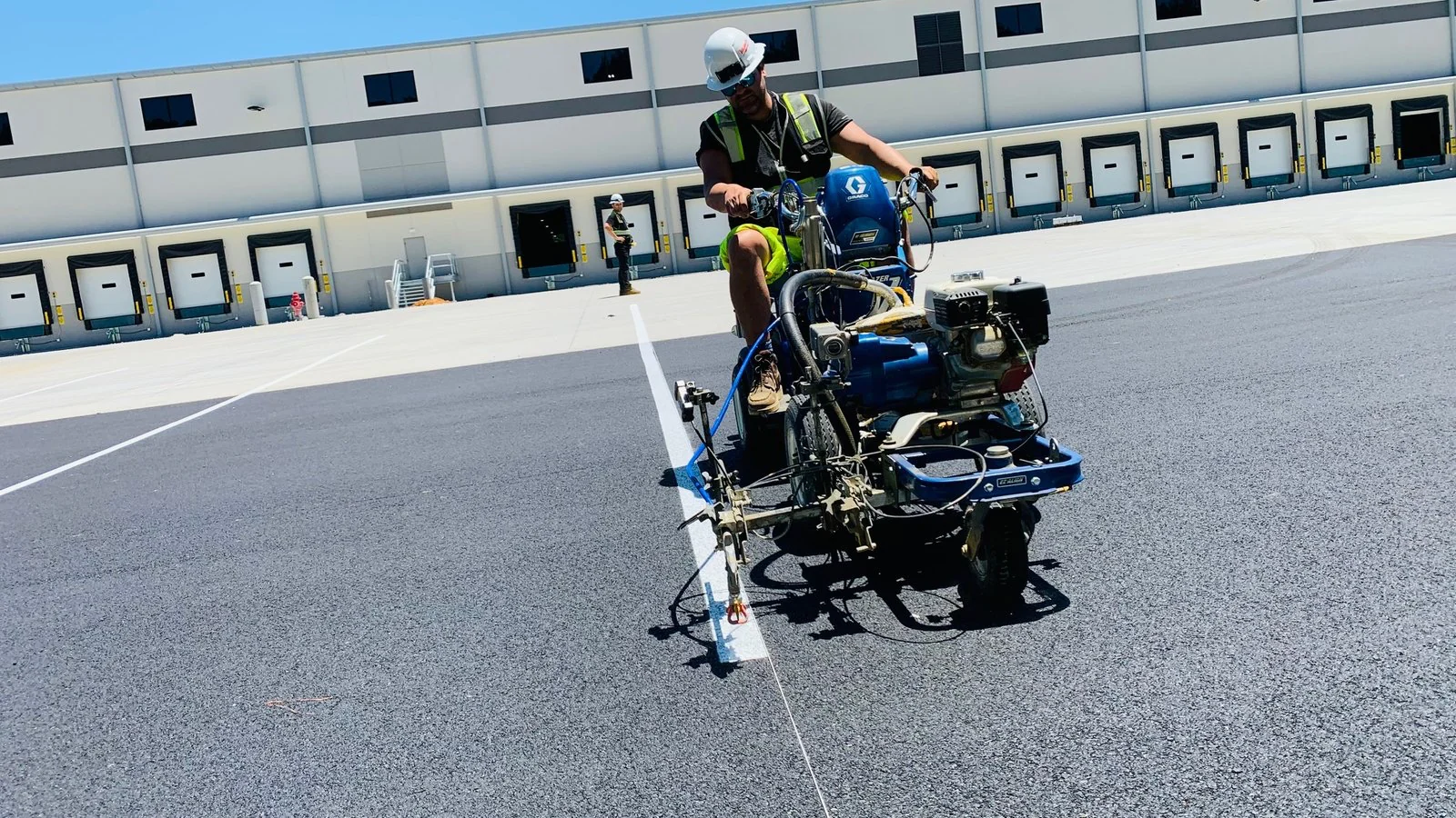 Professional warehouse floor marking removal - grinding and shot blasting surface prep