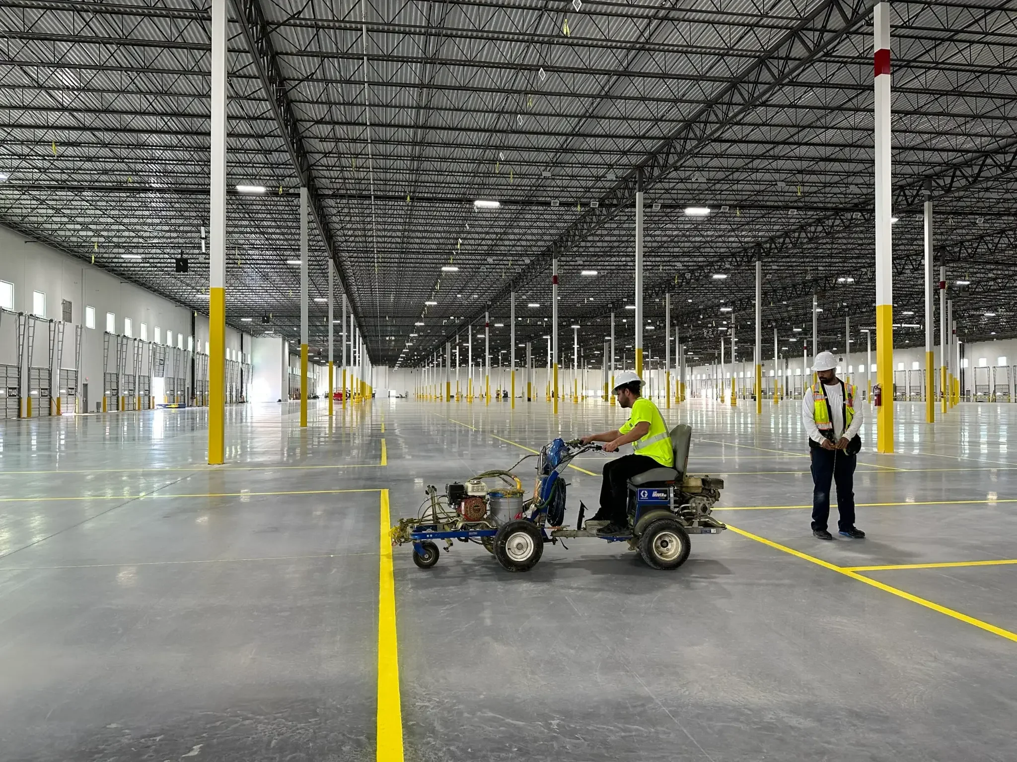 Dock door numbering and truck court lane marking for distribution center