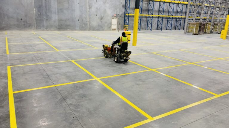Enhance Safety & ROI with Expert Warehouse Floor Striping in Summerfield NC