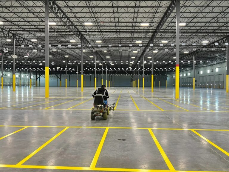 How Does Warehouse Floor Striping Improve Safety in Jacksonville NC?