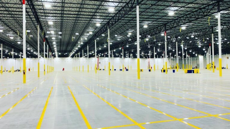 How Does Warehouse Floor Striping Improve Safety in Kernersville, NC?